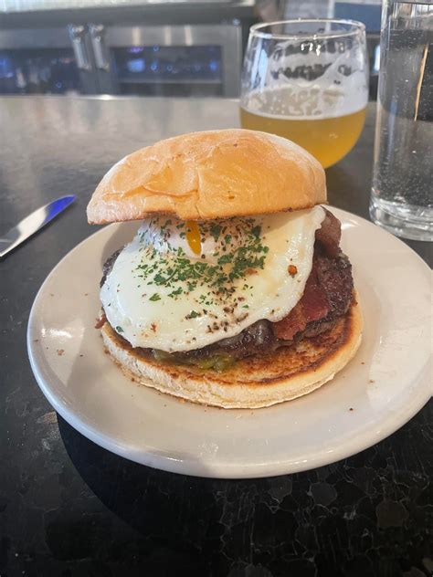 Dmk burger - Jun 3, 2019 · Photo courtesy of DMK Burger Bar. Why We Love It: The original location for DMK Burger Bar is less than one mile away from Wrigley Field in Lakeview. And while fantastic burger choices are plentiful in the area, DMK is the only one serving up 15 varieties, including those made of grass-fed beef and bison. Guests can feel really good about their ...